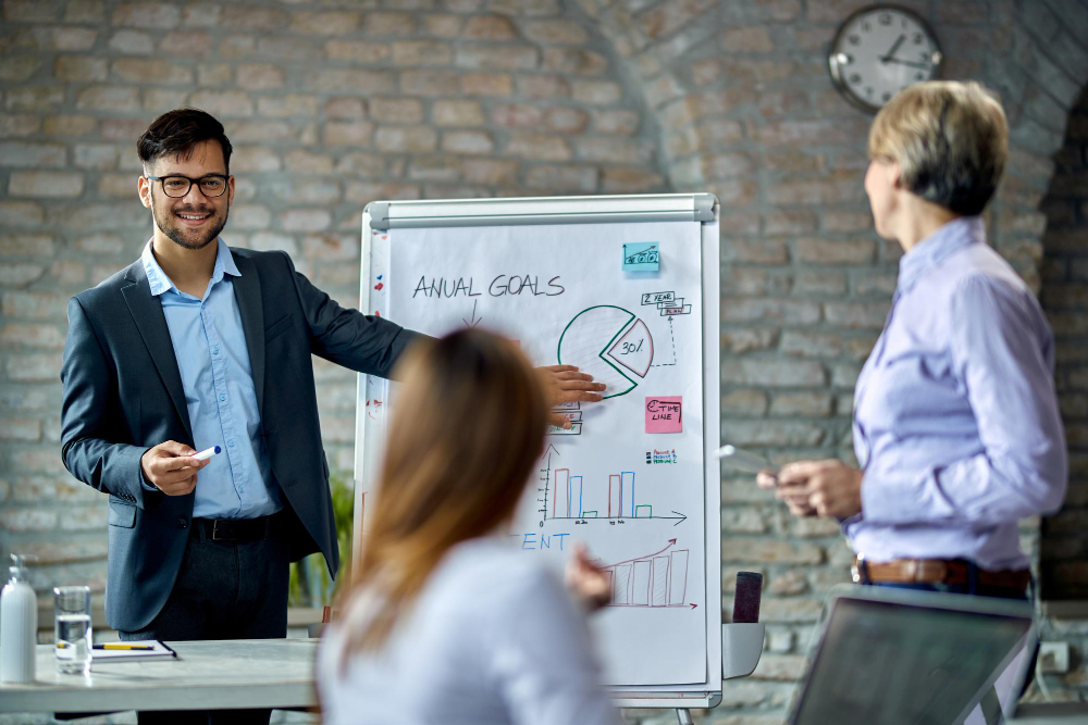 Startup founders pitching on stage during a competition final