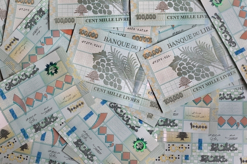 A stack of Lebanese lira banknotes