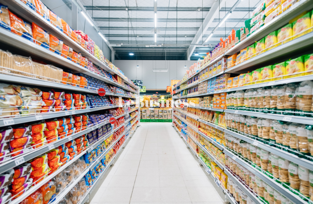 A Lebanese supermarket aisle with shelves of packaged goods and visible price tags