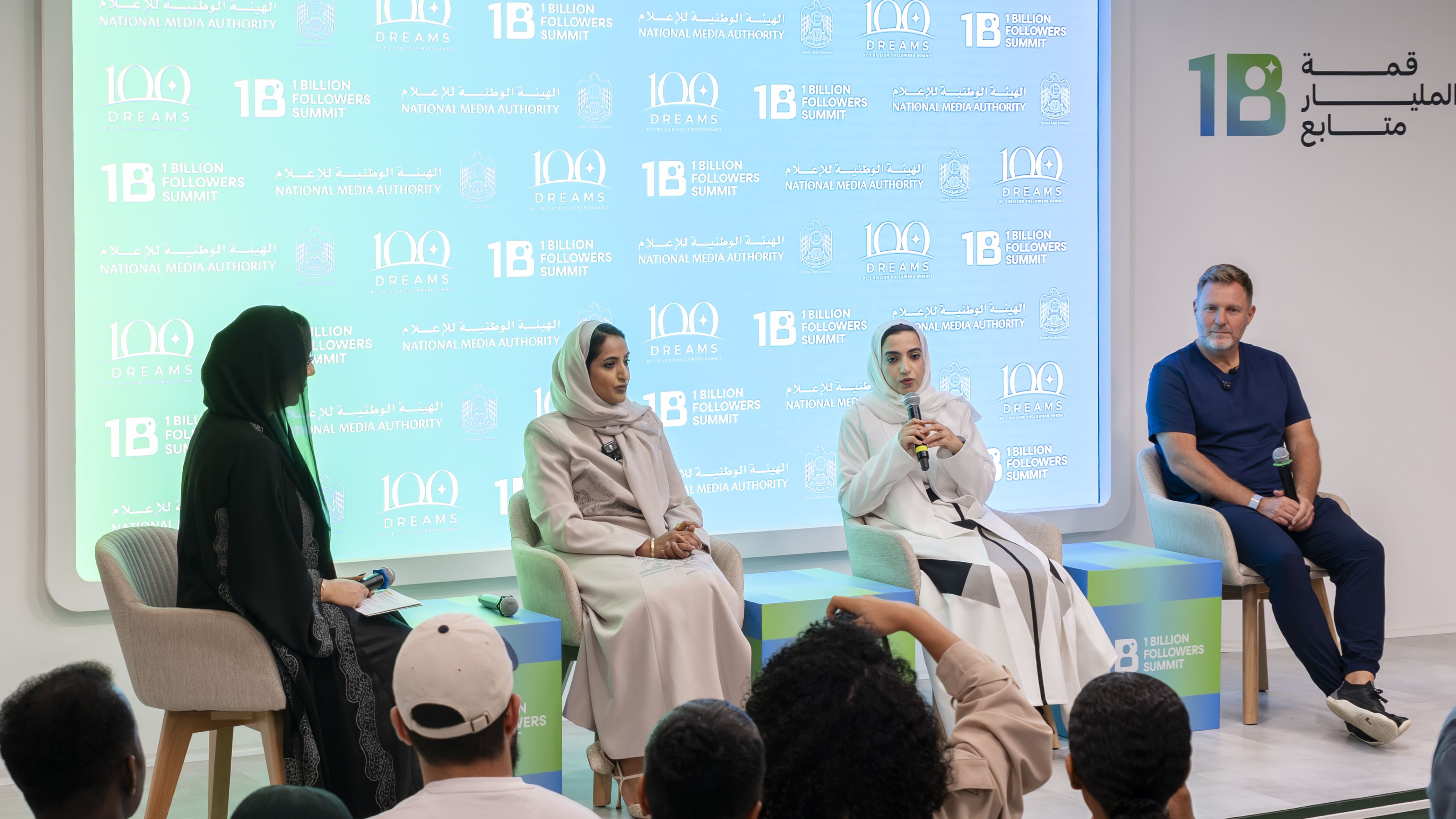 Panel of four speakers launching the 100 Dreams initiative at Creators HQ in Dubai, with an audience in the foreground.